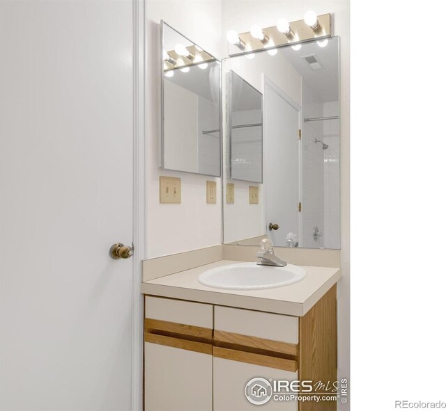 3260 47th St Unit 207A, Boulder, CO 80301 - bathroom featuring vanity and a shower