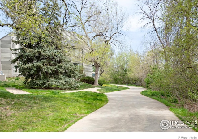 3260 47th St Unit 207A, Boulder, CO 80301 - view of property's community with a lawn