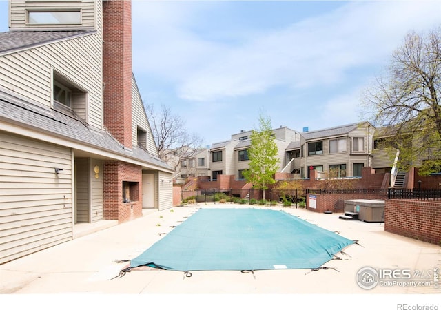 3260 47th St Unit 207A, Boulder, CO 80301 - view of pool featuring a residential view, a patio area, and fence