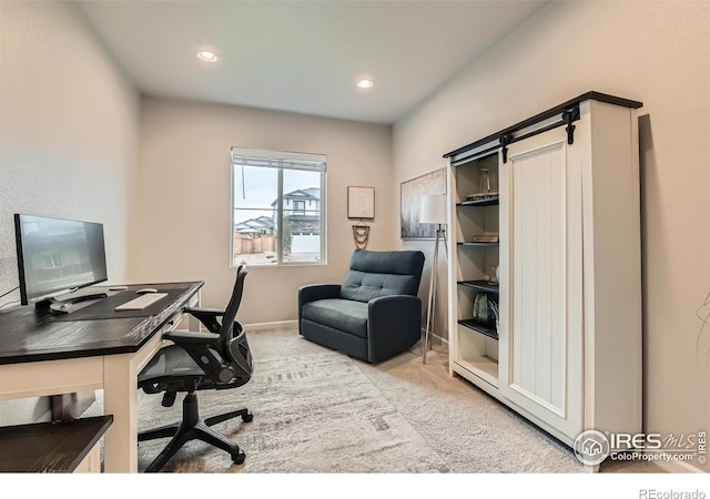 carpeted office space with recessed lighting and baseboards