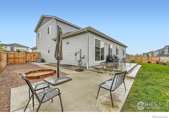 back of house featuring a patio