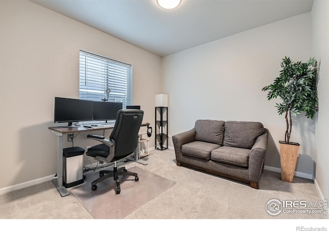 carpeted office with baseboards