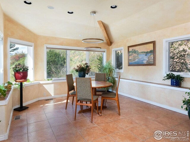 dining area with baseboards, light tile patterned floors, and recessed lighting