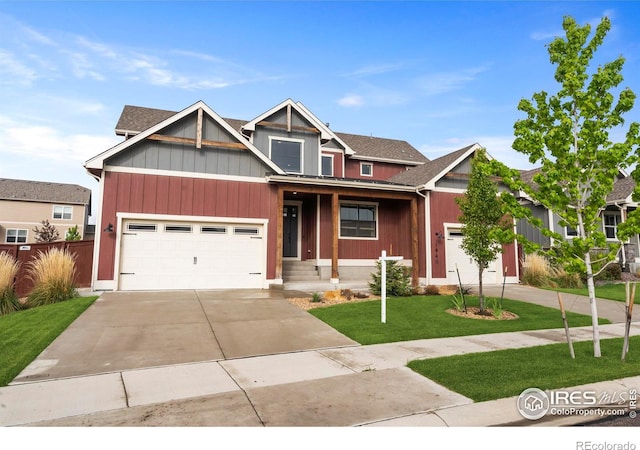 1940 Rolling Wind Dr, Windsor, CO 80550 - view of front of house featuring driveway and a garage