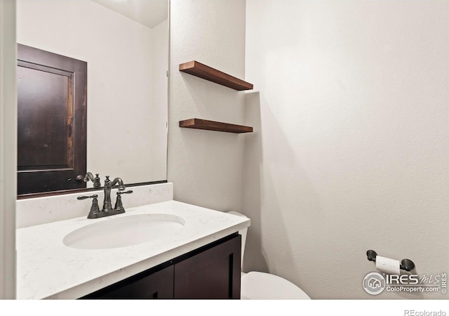 1940 Rolling Wind Dr, Windsor, CO 80550 - bathroom featuring vanity and toilet