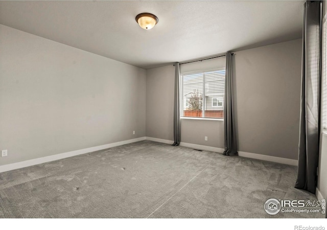 1940 Rolling Wind Dr, Windsor, CO 80550 - unfurnished room featuring carpet flooring and baseboards