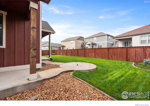 1940 Rolling Wind Dr, Windsor, CO 80550 - view of yard with a residential view and a patio
