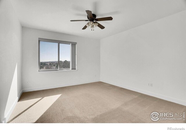 4500 Baseline Rd Unit 4402, Boulder, CO 80303 - spare room with carpet floors, ceiling fan, and baseboards