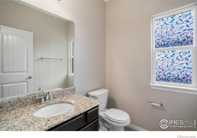 6725 2nd St, Frederick, CO 80530 - bathroom with toilet and vanity
