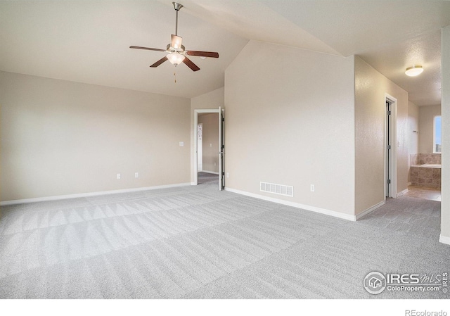 6725 2nd St, Frederick, CO 80530 - empty room featuring a ceiling fan, light colored carpet, vaulted ceiling, and baseboards