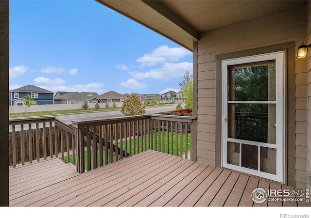 6725 2nd St, Frederick, CO 80530 - wooden deck featuring a residential view