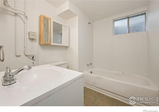 full bath featuring vanity and shower / tub combination