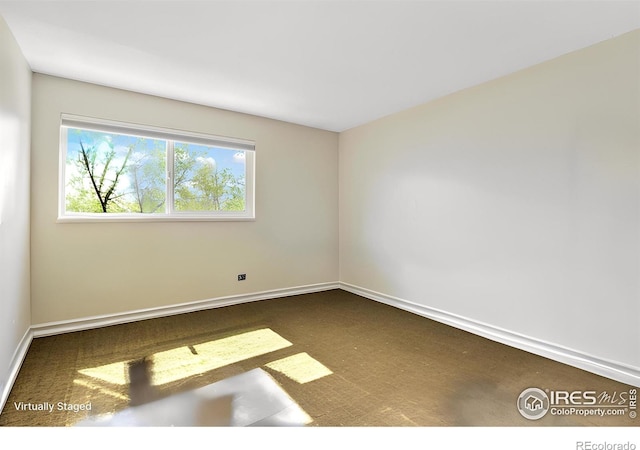 4160 Monroe Dr Unit B, Boulder, CO 80303 - unfurnished room with baseboards and dark carpet
