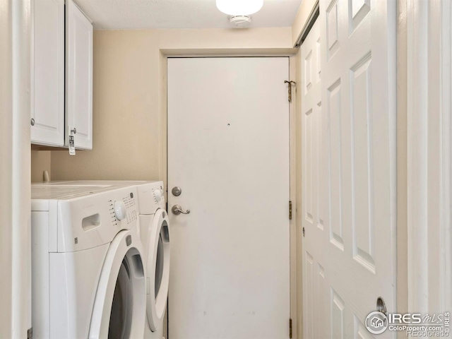 4160 Monroe Dr Unit B, Boulder, CO 80303 - laundry area featuring washer and dryer and cabinet space