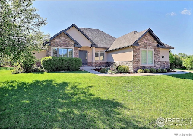 craftsman inspired home with stone siding, stucco siding, and a front yard