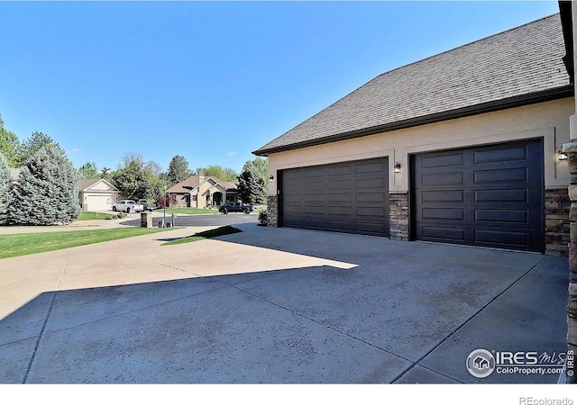 garage with driveway