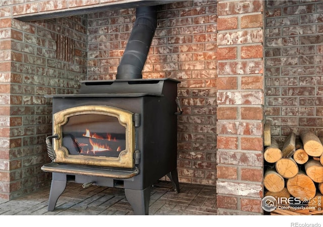 detailed view of a wood stove and brick wall
