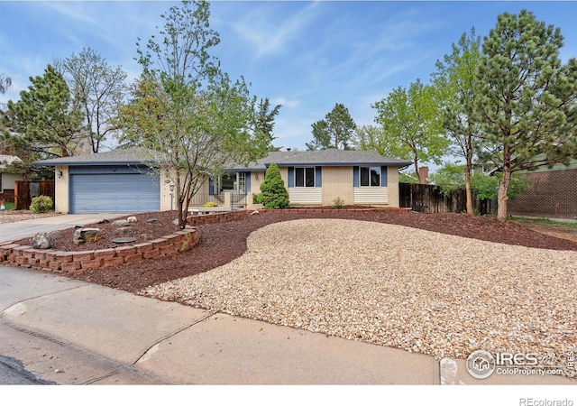 3917 W 21st Street Rd, Greeley, CO 80634 - single story home featuring driveway, brick siding, and an attached garage