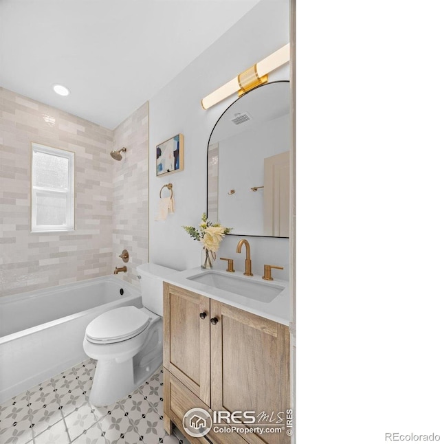 full bathroom with toilet,  shower combination, vanity, and tile patterned floors