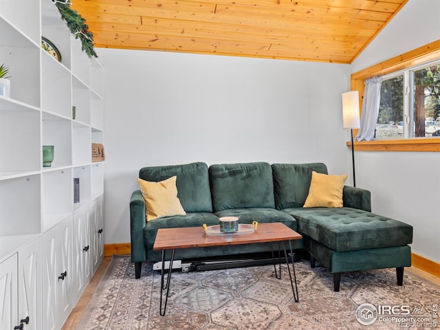 1221 Griffith Ct, Estes Park, CO 80517 - living room featuring vaulted ceiling, wood ceiling, baseboards, and wood finished floors