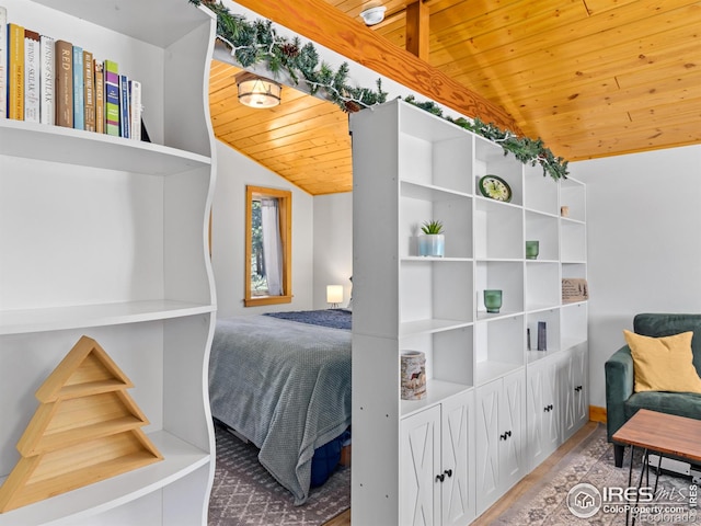 1221 Griffith Ct, Estes Park, CO 80517 - bedroom featuring wood ceiling, lofted ceiling, wood finished floors, and baseboards
