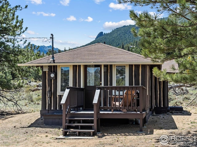 1221 Griffith Ct, Estes Park, CO 80517 - rear view of property with a deck with mountain view