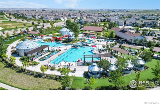 2137 Setting Sun Dr, Windsor, CO 80550 - aerial perspective of suburban area with a pool area
