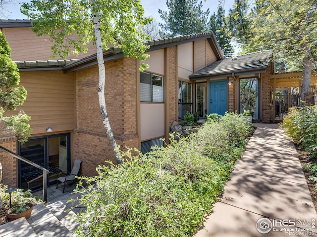 700 Poplar Ave, Boulder, CO 80304 - view of front of property featuring brick siding