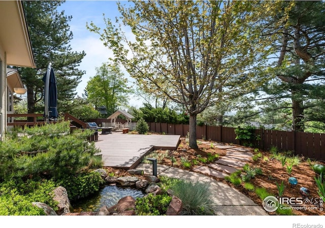 560 Northstar Ct, Boulder, CO 80304 - fenced backyard featuring a wooden deck