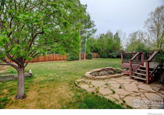 view of yard featuring a deck