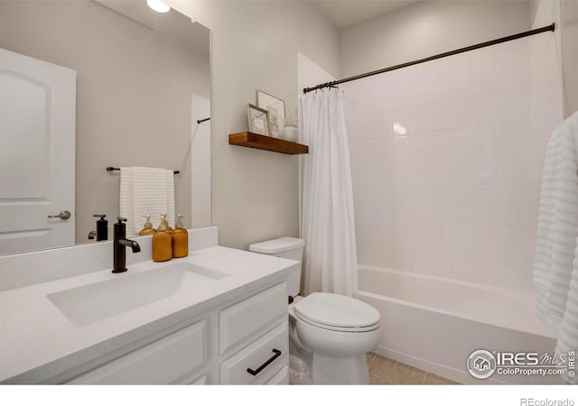 bathroom featuring toilet, vanity, shower / tub combo, and tile patterned flooring