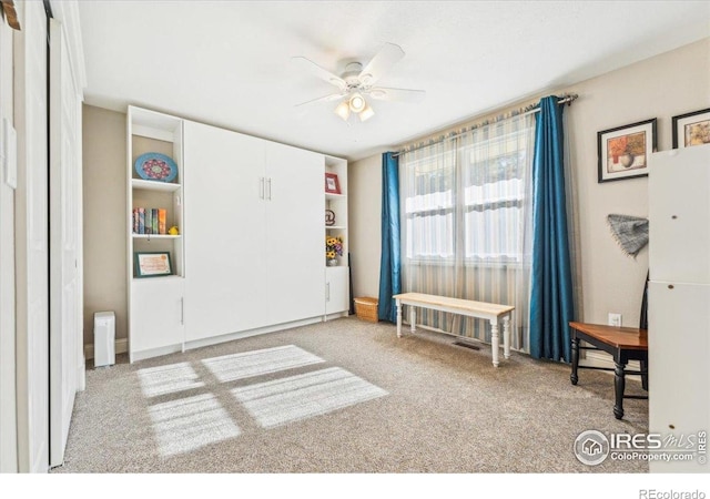 4880 Filbert Dr, Loveland, CO 80538 - rec room featuring carpet and a ceiling fan