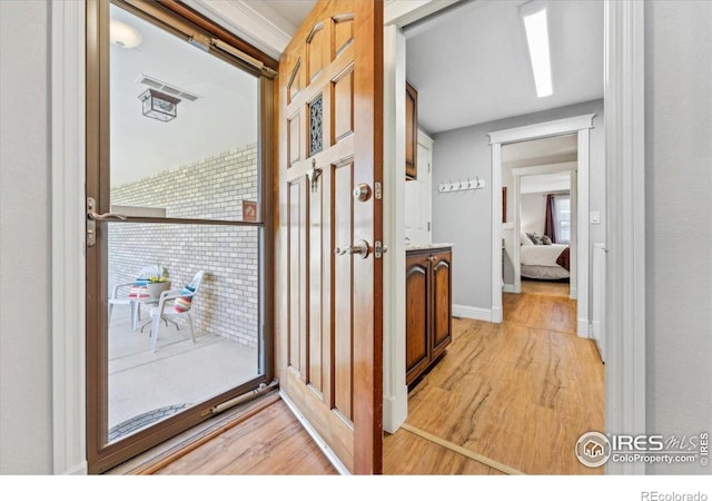 4880 Filbert Dr, Loveland, CO 80538 - corridor featuring light wood-type flooring