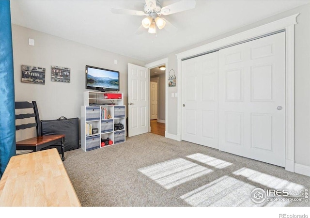 4880 Filbert Dr, Loveland, CO 80538 - bedroom featuring carpet flooring, a closet, ceiling fan, and baseboards