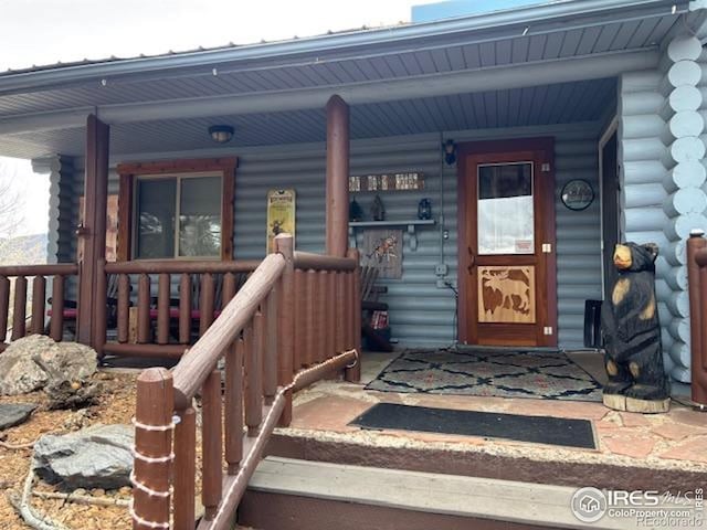 1810 N Ridge Ln, Estes Park, CO 80517 - doorway to property with a porch