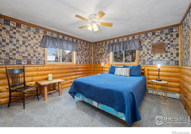 1810 N Ridge Ln, Estes Park, CO 80517 - carpeted bedroom with a baseboard radiator, wallpapered walls, log walls, and ceiling fan