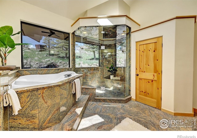 6553 Sunshine Canyon Dr, Boulder, CO 80302 - full bath featuring a marble finish shower, a bath, stone finish flooring, baseboards, and vaulted ceiling