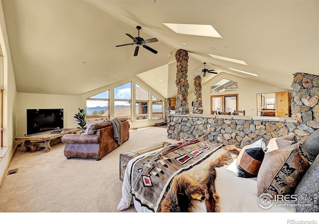 6553 Sunshine Canyon Dr, Boulder, CO 80302 - bedroom featuring carpet, a skylight, multiple windows, and high vaulted ceiling