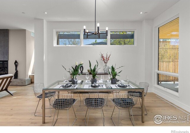 2814 3rd St, Boulder, CO 80304 - dining space featuring a chandelier, light wood finished floors, recessed lighting, and baseboards