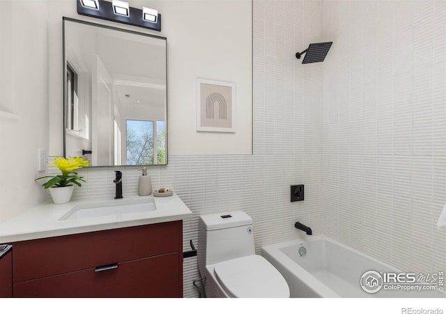 2814 3rd St, Boulder, CO 80304 - bathroom with vanity, toilet, tile walls, and tub / shower combination