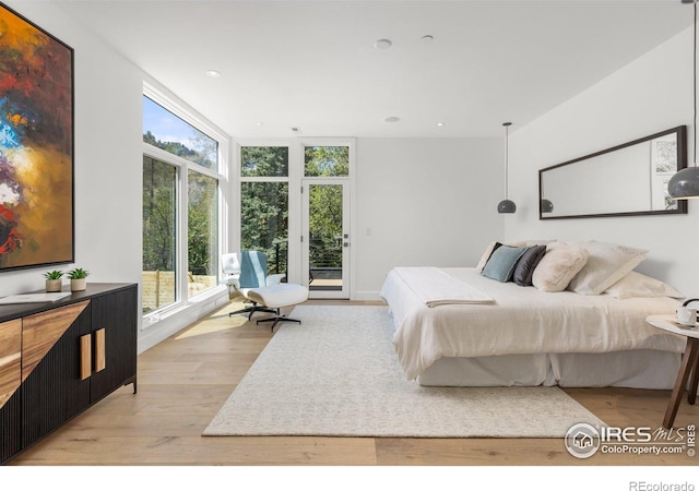 2814 3rd St, Boulder, CO 80304 - bedroom with multiple windows, light wood-style floors, access to outside, floor to ceiling windows, and recessed lighting