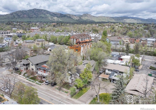 aerial view of residential area with a mountainous background