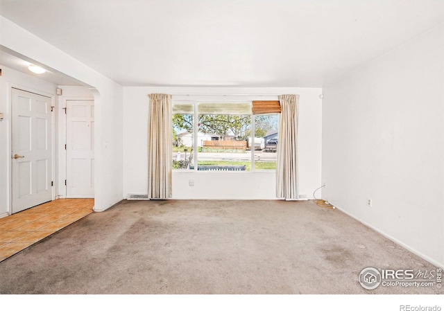 view of carpeted spare room