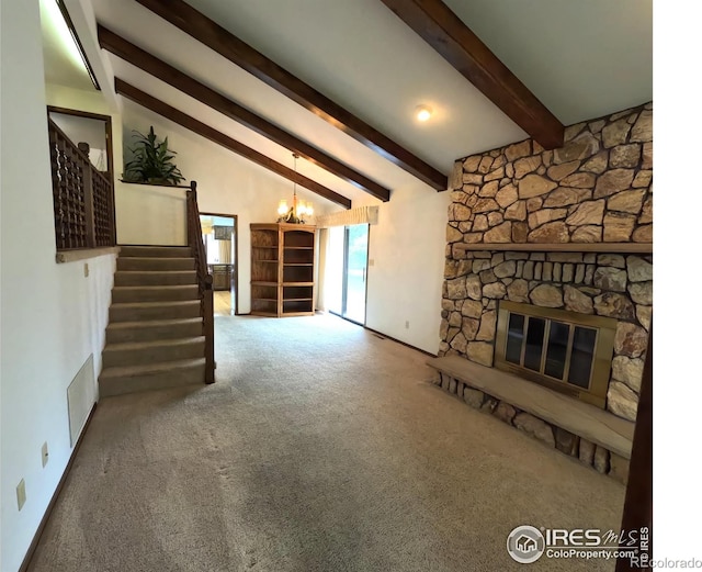 718 Linda St, Fort Morgan, CO 80701 - unfurnished living room featuring a chandelier, carpet floors, stairway, a fireplace, and baseboards