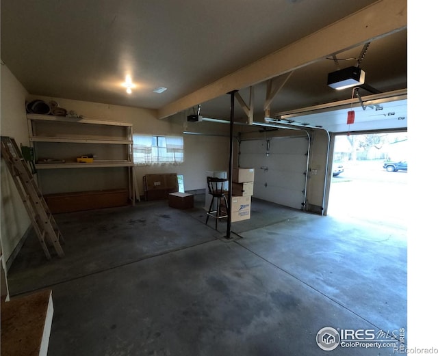 718 Linda St, Fort Morgan, CO 80701 - garage featuring a garage door opener