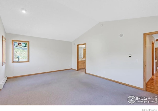 272 Solomon Dr, Estes Park, CO 80517 - unfurnished room featuring light carpet, baseboards, and lofted ceiling