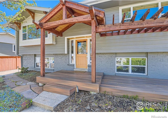 2550 Woodstock Pl, Boulder, CO 80305 - property entrance with brick siding and fence
