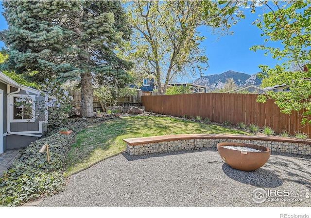2550 Woodstock Pl, Boulder, CO 80305 - view of yard featuring a patio and a mountain view