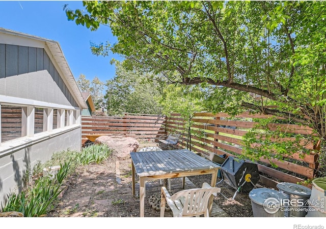 2550 Woodstock Pl, Boulder, CO 80305 - view of patio / terrace with a fenced backyard and outdoor dining space
