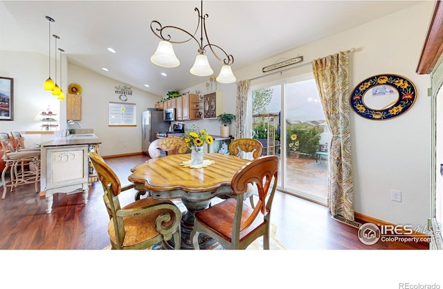 dining room with vaulted ceiling, wood finished floors, healthy amount of natural light, baseboards, and recessed lighting